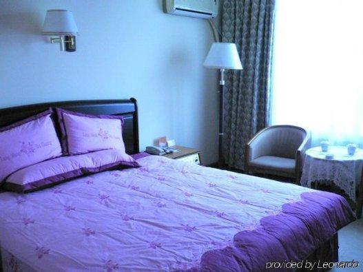 Gan Jin Hotel Tianjin Quarto foto