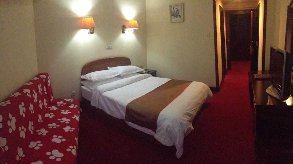 Gan Jin Hotel Tianjin Quarto foto