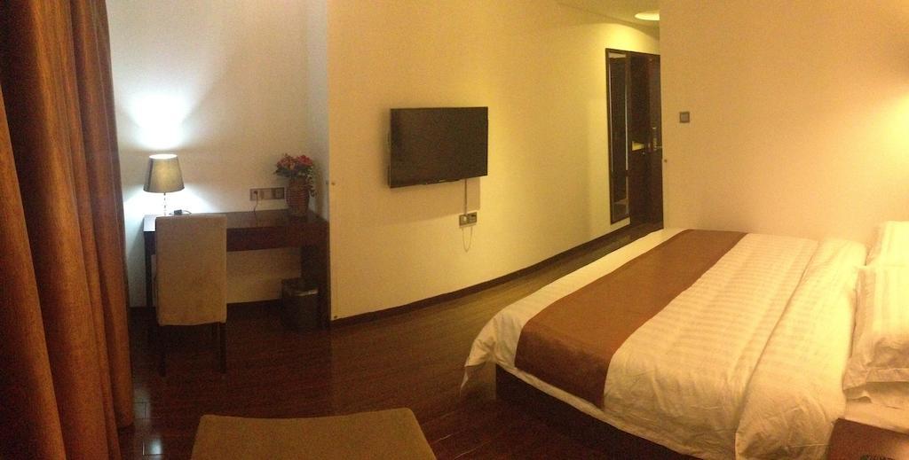 Gan Jin Hotel Tianjin Quarto foto