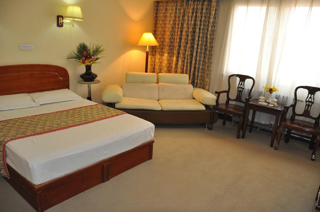 Gan Jin Hotel Tianjin Quarto foto