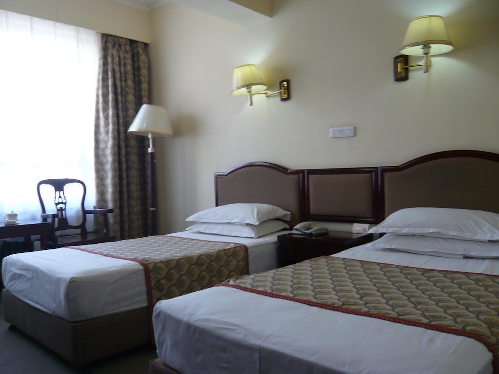 Gan Jin Hotel Tianjin Quarto foto