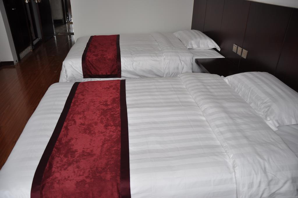 Gan Jin Hotel Tianjin Quarto foto